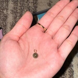 Tiny gold filled green jade pendant